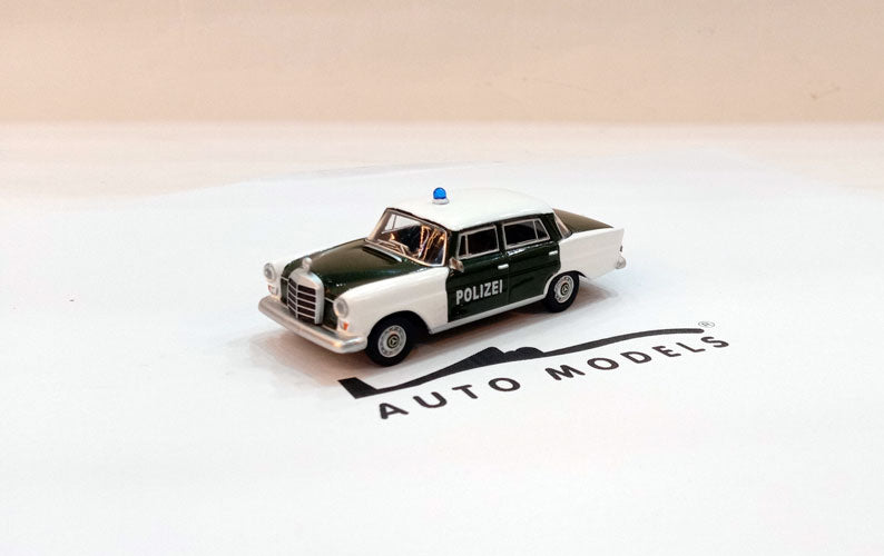 Schuco Mercedes Benz 200D (W110) Polizei White Green